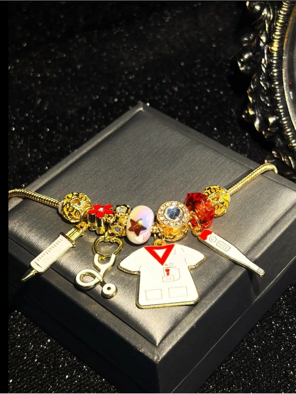 Gold-Tone Nurse Charm Bracelet with White and Red Accents